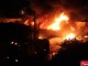 آتش سوزی منبع گازوئیل و سقوط دکل همراه اول در بوشهر +تصاویر